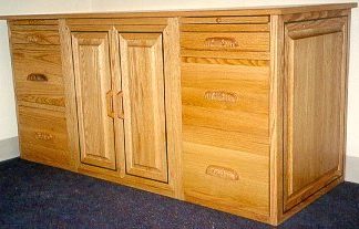 Red oak credenza with a purpleheart border inlay.