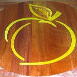 yellow heart wood peach logo